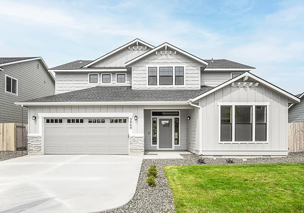 Front exterior of a new two level CBH home.