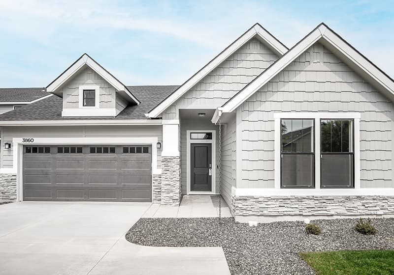 Front exterior of a new two level CBH home.