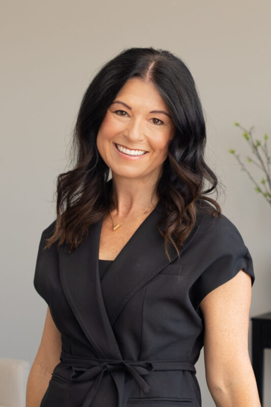 Professional portrait of Holly Haener, Director of Sales Operations at CBH Homes, leading sales strategy and operational excellence across the Treasure Valley.