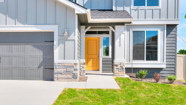 Entryway of house with yellow door