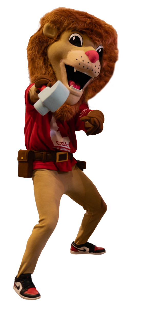 Photo of Big Red, CBH Home's mascot. a man in a lion costume with a CBH Homes shirt and tool belt on.