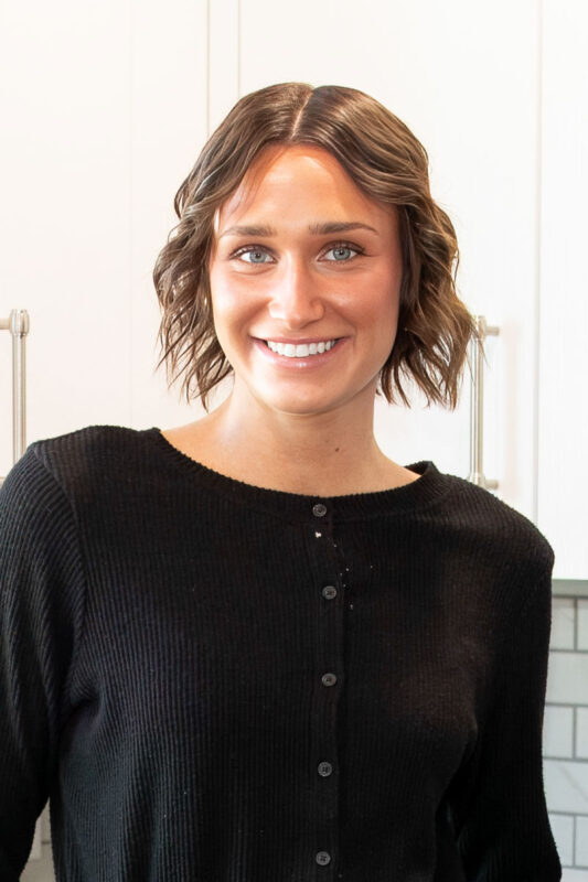 Miya from CBH Homes sales team smiling warmly in professional headshot