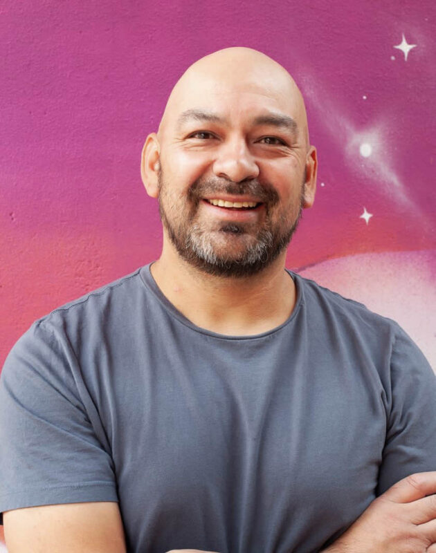 Smiling artist Bobby Gaytan